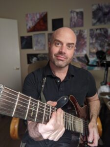 Scott Kasun teaches guitar and piano at Allegro Music and dance in Tucson, AZ.