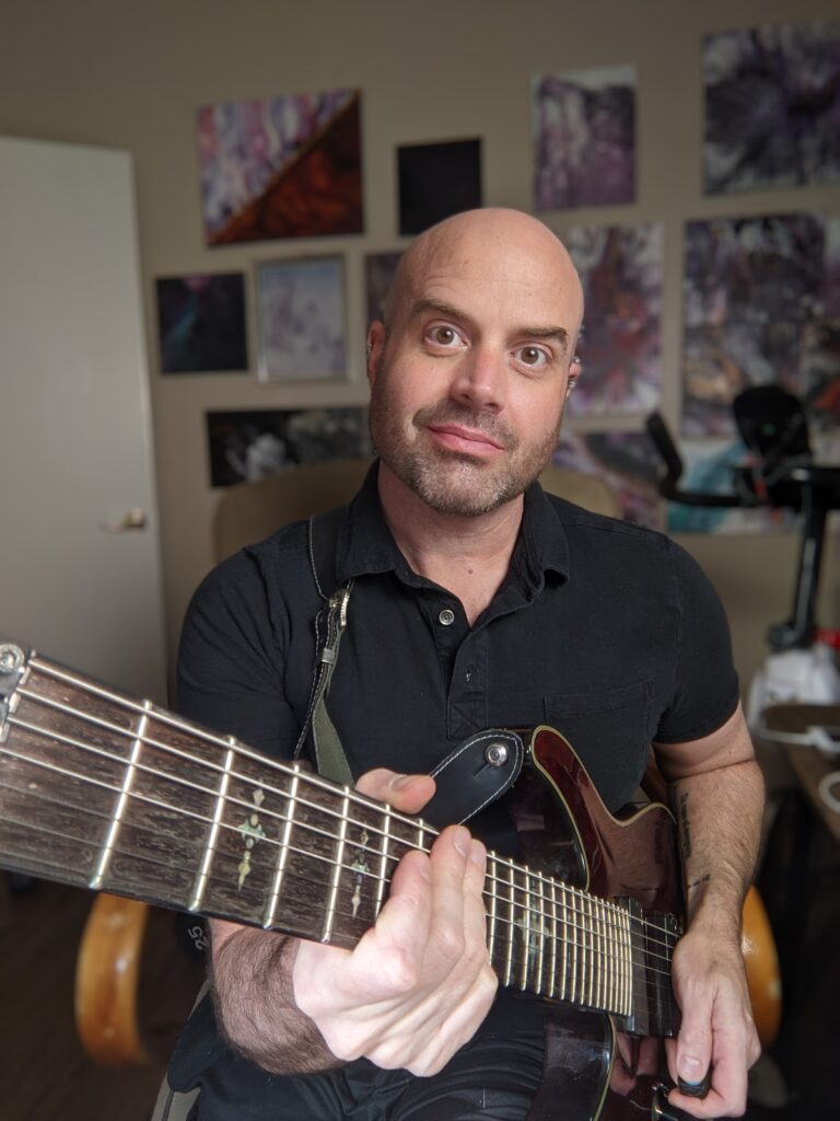 Scott Kasun teaches guitar and piano at Allegro Music and dance in Tucson, AZ.