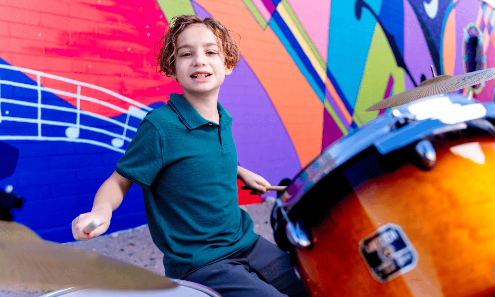 Drum student at Allegro Music and Dance in Tucson plays at Southwest Strings.