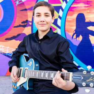 Electric guitar students at Allegro in Tucson plays a les Paul.