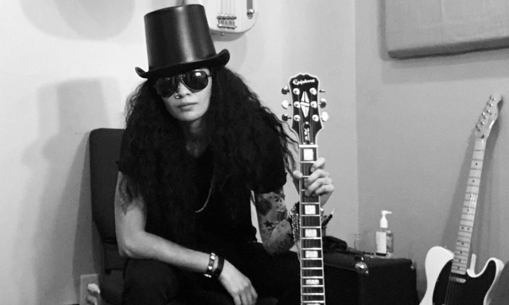 Student at Allegro Music and Dance dressed as Slash from Guns N Roses for Halloween Talent Contest.