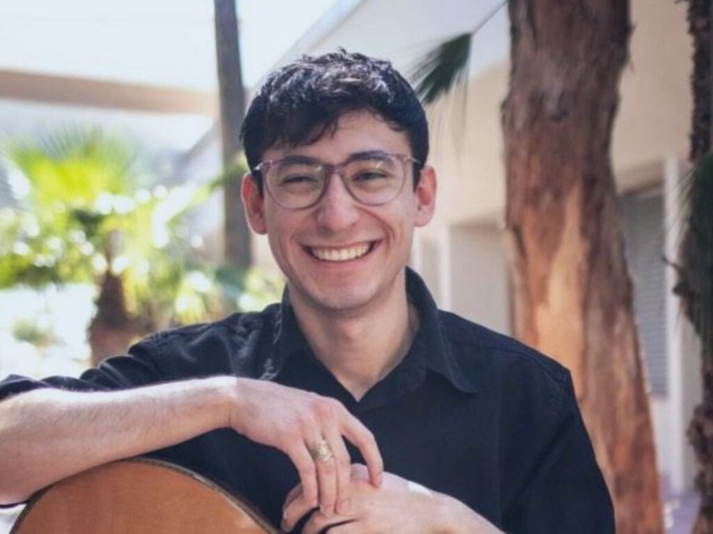 Alejandro, a guitar teacher at Allegro Music & Dance in Tucson