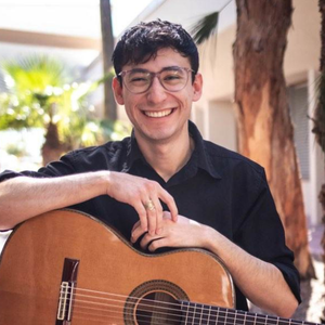 Alejandro Arenas teaches guitar, bass, and ukulele at Allegro Music & Dance in Tucson.