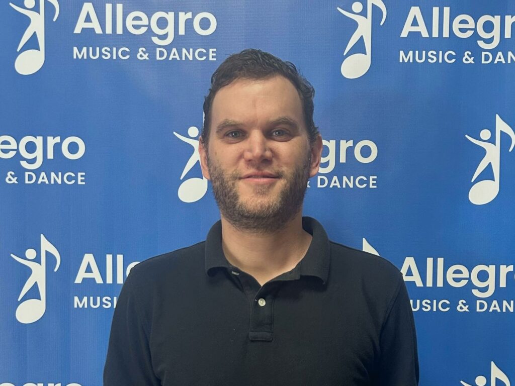 John, a piano teacher at Allegro Music & Dance in Tucson