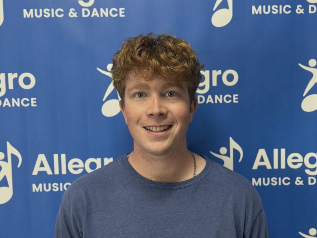 Cameron, a guitar teacher at Allegro Music & Dance in Tucson