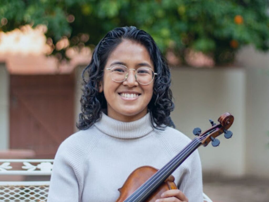 Jennalyn, a violin and cello teacher at Allegro Music & Dance in Tucson
