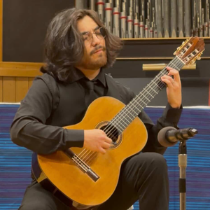 Jordin Angulo teaches guitar at Allegro Music & Dance in Tucson.