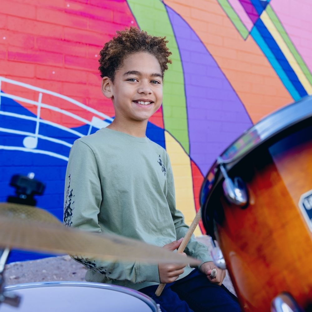Student learning drums at Allegro Music & Dance in Tucson
